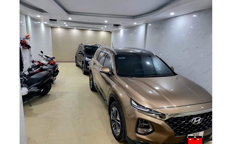 Bán Nhà cực VIP phố Thái Hà, DT 118m2, MT 6m, 1 nhà ra phố, thang máy, garage oto. Giá 35 tỷ.