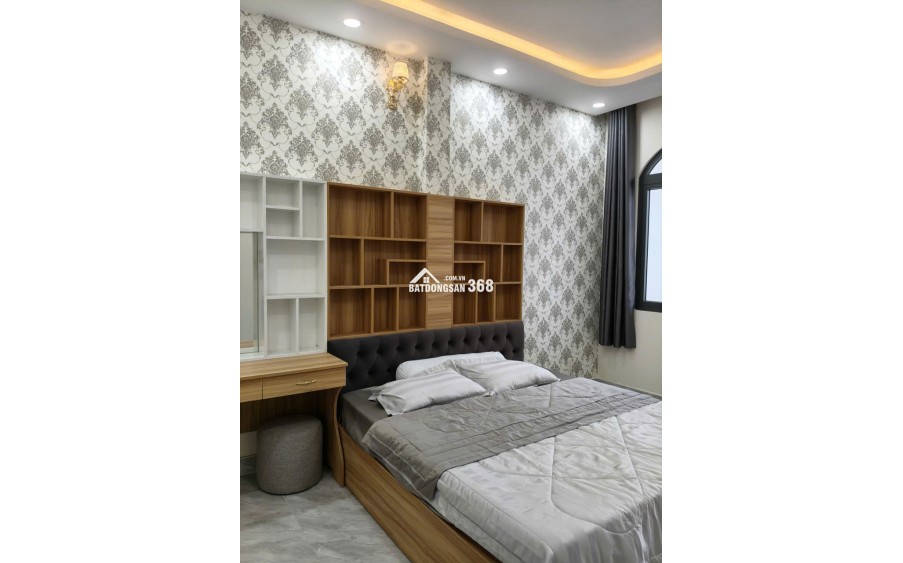 Nhà 1 trệt 2 lầu 12x8,5 Xây dựng 8x8,5 BTCT 4PN 4WC, có Gara Ô tô riêng