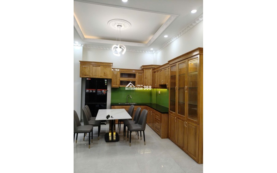 Nhà 1 trệt 2 lầu 12x8,5 Xây dựng 8x8,5 BTCT 4PN 4WC, có Gara Ô tô riêng