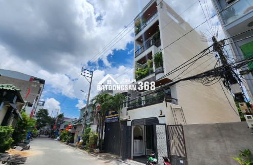 Bán nhà mặt phố Hà Huy Giáp, Q.12. DT 69m2, 4 tầng, 4PN, sổ đỏ, giá 8.7 tỷ. LH: 0328335140
