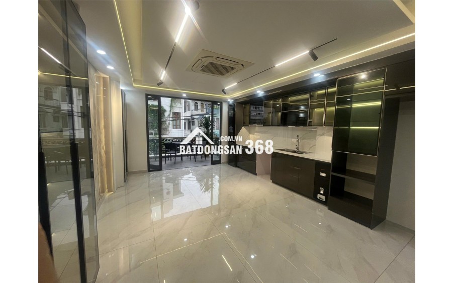 Siêu phẩm nhà đẹp mặt đường Đông Trà 5 tầng thang máy ô tô đỗ cửa kinhdoanh buôn bán tốt