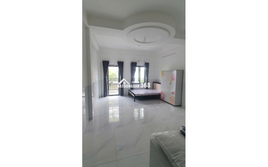 Căn Hộ Dịch Vụ , GS ngay Go Dĩ An , 1 hầm 4 tầng , Thang máy , 8 Phòng